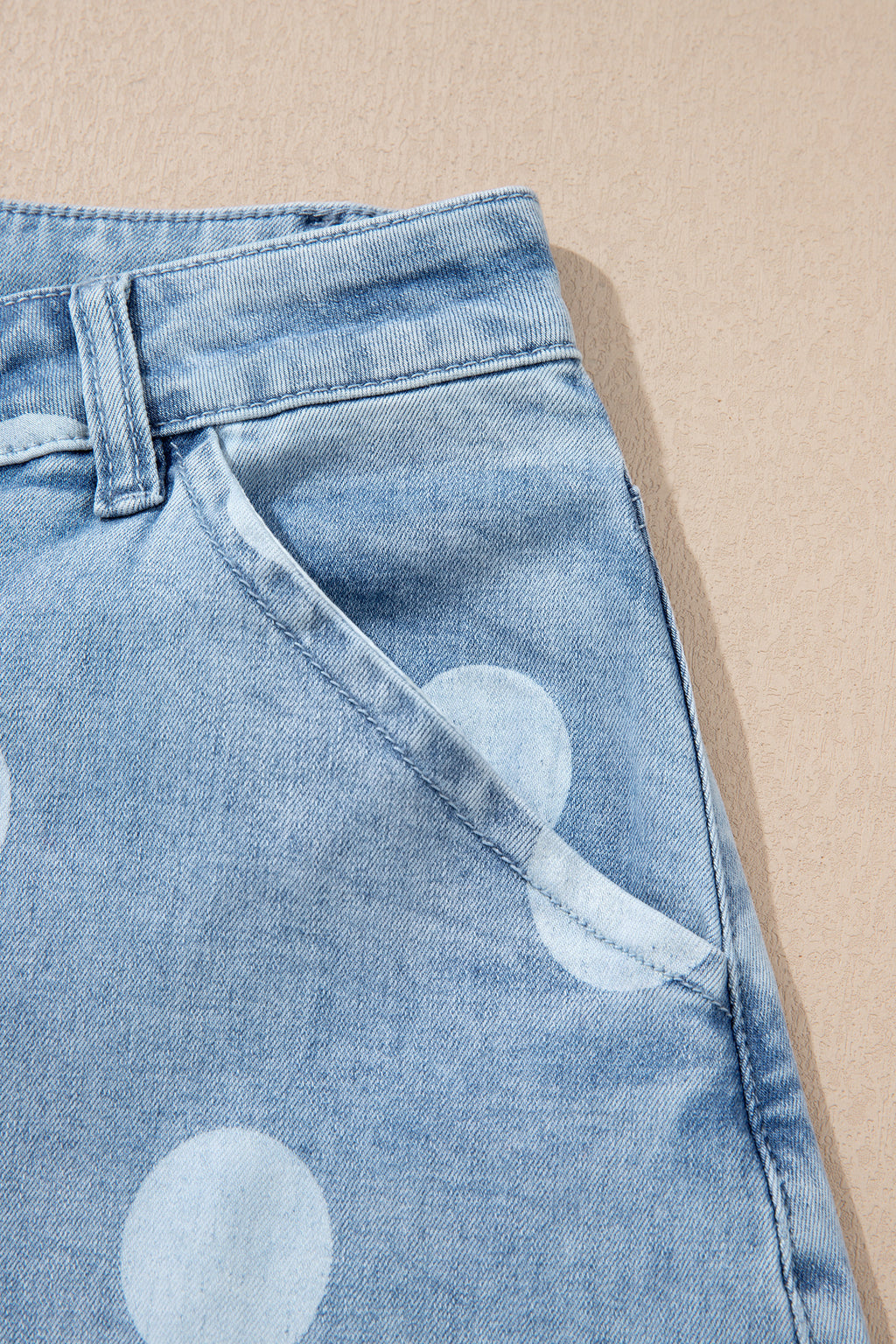 Polka dot ankle-length casual jeans with metal buttons from Dear-Lover, showing the stylish denim bottoms with dotted pattern.