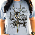 Ice blue women's graphic T-shirt by Envy Stylz Wholesale with "I Do a Thing Called What I Want" design, casual and comfortable fit.