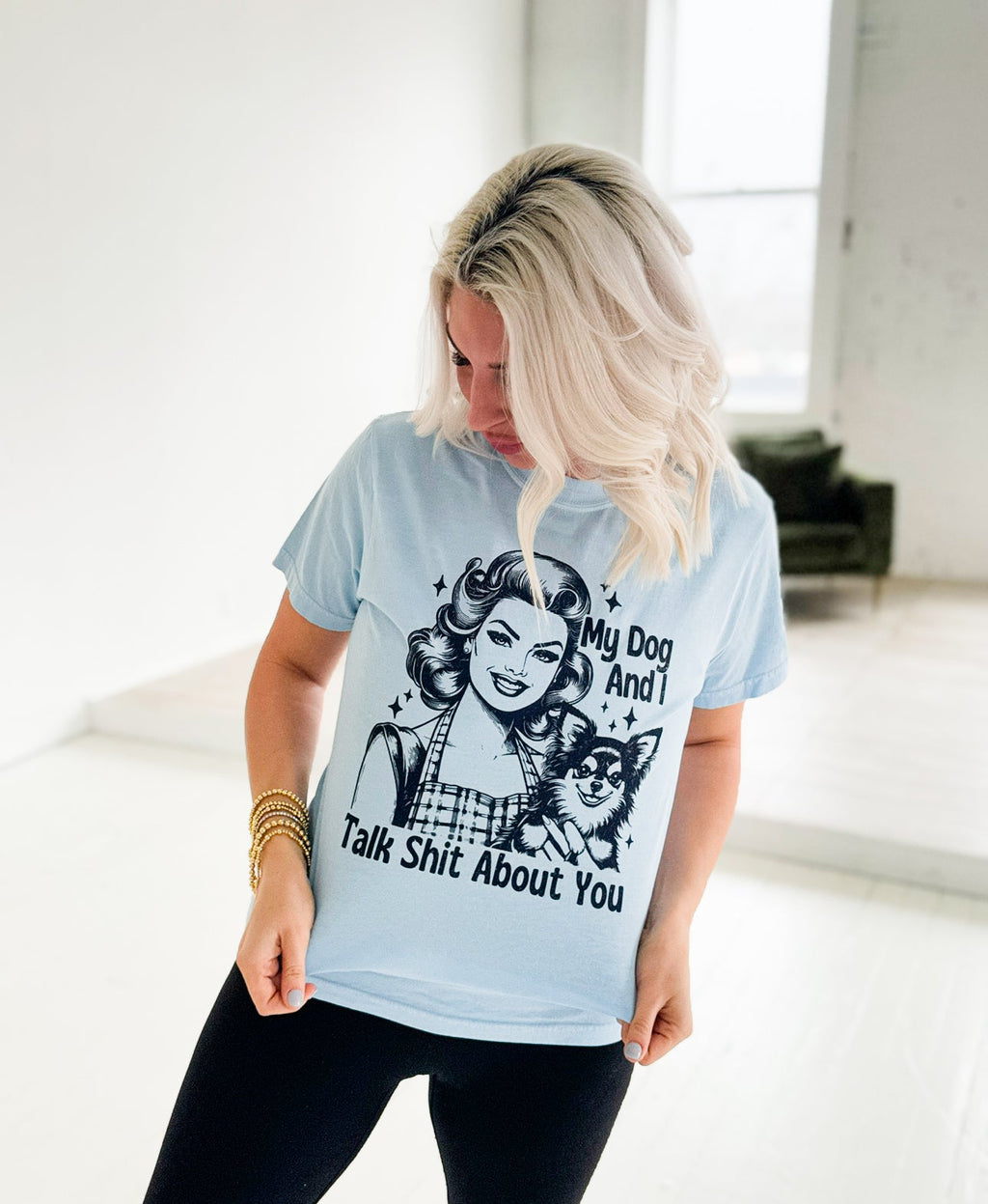 Women’s graphic T-shirt by Envy Stylz Wholesale featuring a humorous "My Dog And I Talk About You" design in comfort colors.