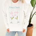 Women’s white T-shirt with a "Talk Dirty To Me Martini" graphic by Envy Stylz Wholesale, casual unisex style.