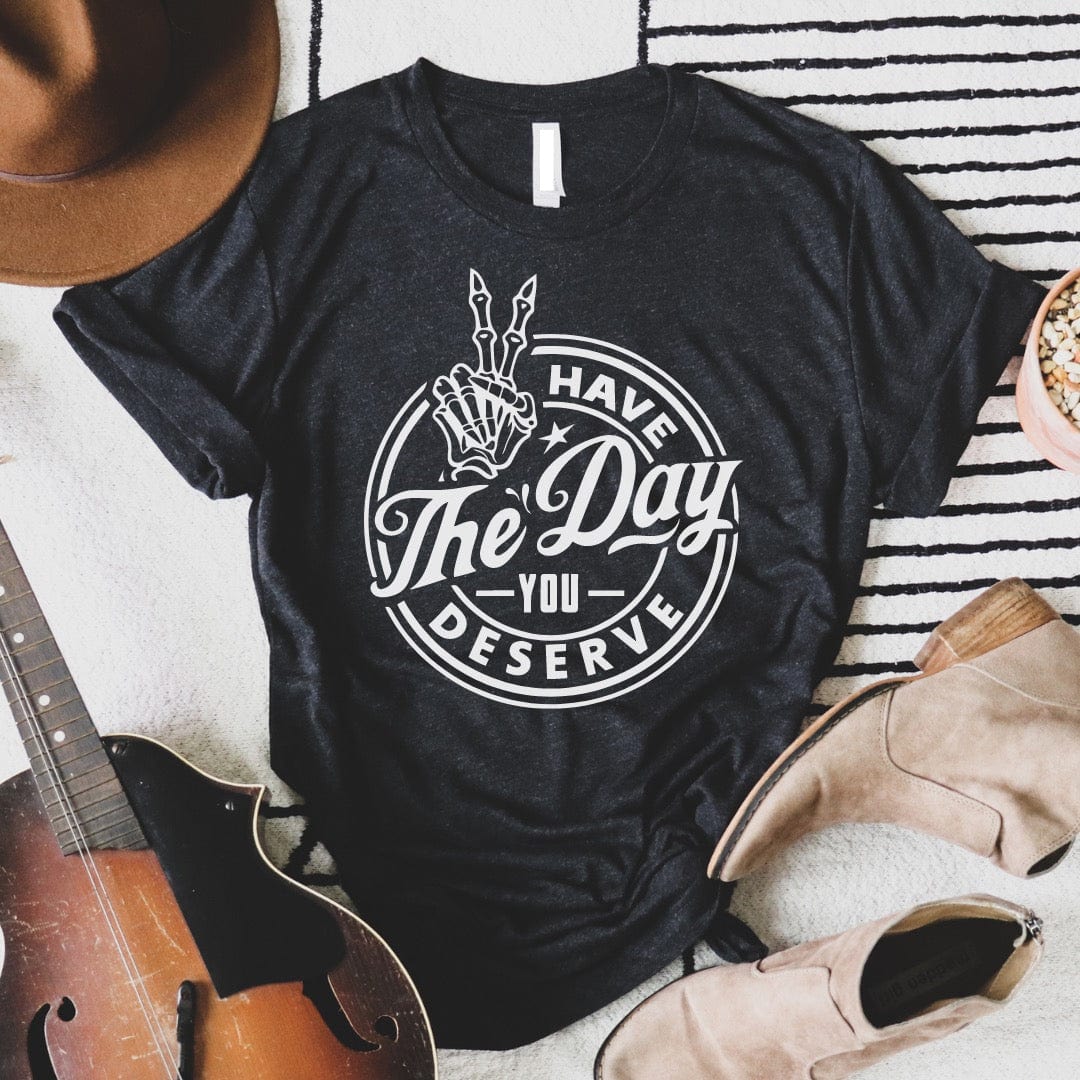 Women’s Heather Gray Graphic T-Shirt by Envy Stylz Wholesale with "Have The Day You Deserve" slogan, soft cotton fabric.
