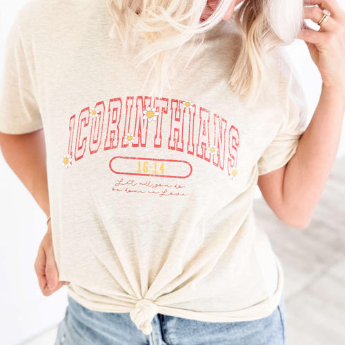 Oatmeal women's graphic T-shirt by Envy Stylz Wholesale featuring a 1 Corinthians 16:14 design, casual apparel shirt.