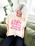 Oatmeal graphic T-shirt for women featuring bold "I've Got a Good Heart But This Mouth" design from Envy Stylz Wholesale