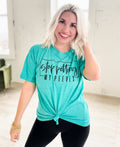 Teal women's graphic t-shirt with "Stop Petting My Peeves" slogan, casual unisex style from Envy Stylz Wholesale.