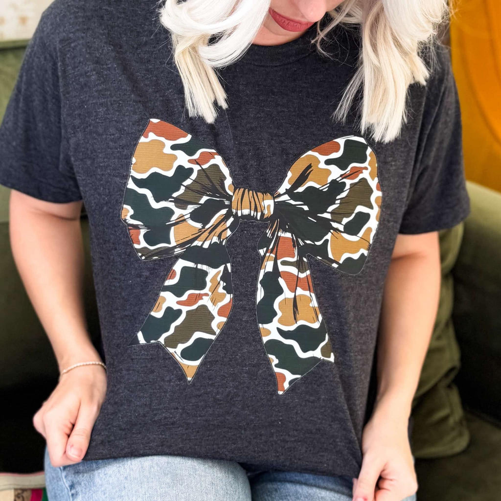 Heather graphite camo bow graphic T-shirt for women by Envy Stylz Wholesale, casual unisex apparel shirt.