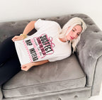 White women's graphic T-shirt by Envy Stylz Wholesale featuring the bold text "Suspect Claims She Has So Much To Do."