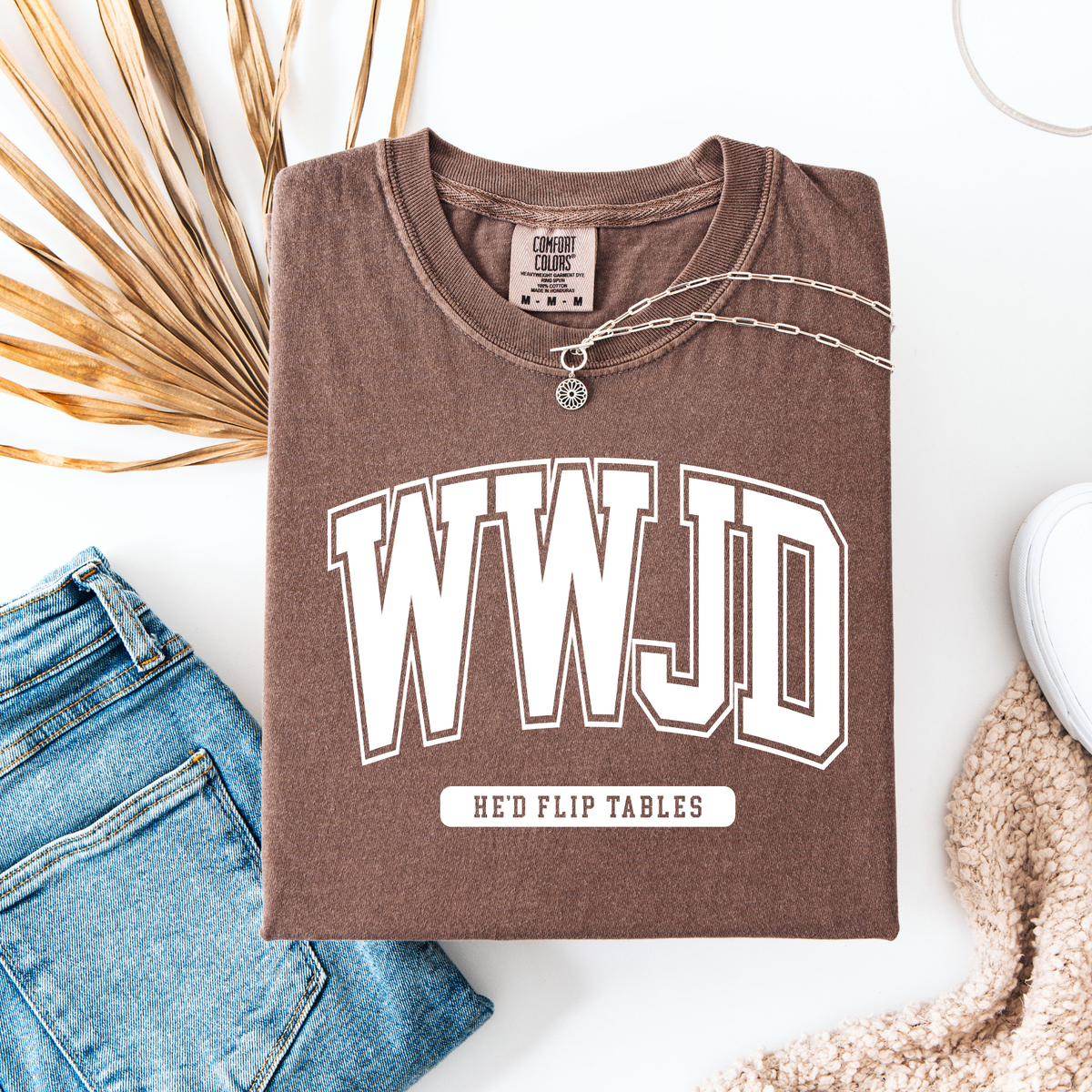 Women's WWJD Flip Tables graphic T-shirt by FestiviTees, casual shirt featuring a Christian-themed flip tables design.