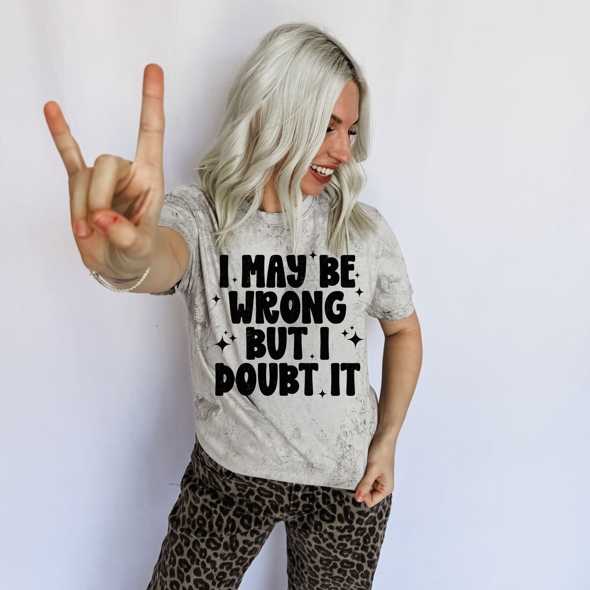 Women’s graphic T-shirt from FestiviTees with bold “I May Be Wrong But I Doubt It” print, casual apparel for everyday wear.