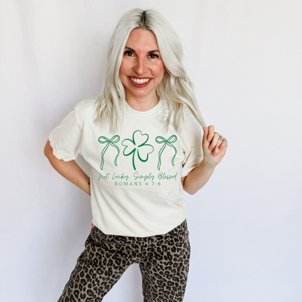 Women’s Simply Blessed graphic T-shirt by FestiviTees featuring “Not Lucky” design, casual apparel with a comfortable fit.