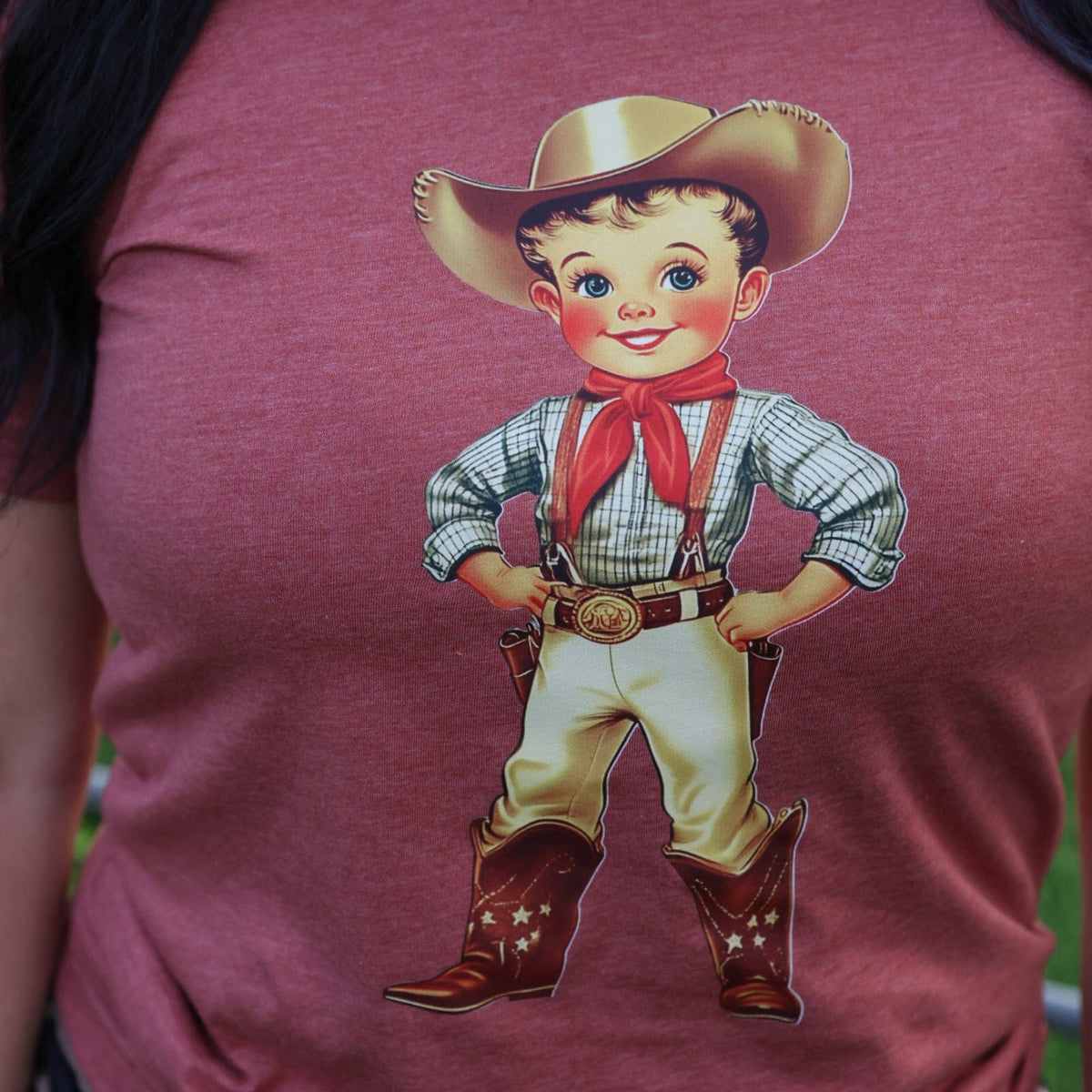 Women’s Retro Cowboy Kid Soft Graphic T-Shirt by FestiviTees featuring a vintage cowboy kid print on a casual tee.