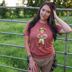 Women’s Retro Cowboy Kid soft graphic T-shirt by FestiviTees featuring a vintage cowboy kid illustration on a casual tee.