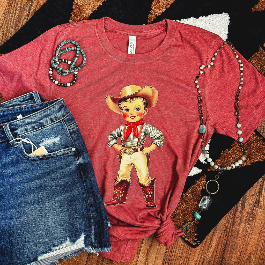 Unisex retro cowboy kid graphic T-shirt for women by FestiviTees, featuring a soft, vintage-style cowboy print on a casual tee.