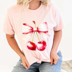 Pink watercolor cherries bow graphic T-shirt for women by FestiviTees, casual apparel with colorful cherry design.
