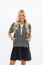 Black striped knit top with attached skirt, women's dress by Grace+Emma, featuring a fitted bodice and stylish design.