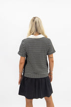 Black striped knit top with attached skirt, women's dress by Grace+Emma, stylish and comfortable fashion ensemble.