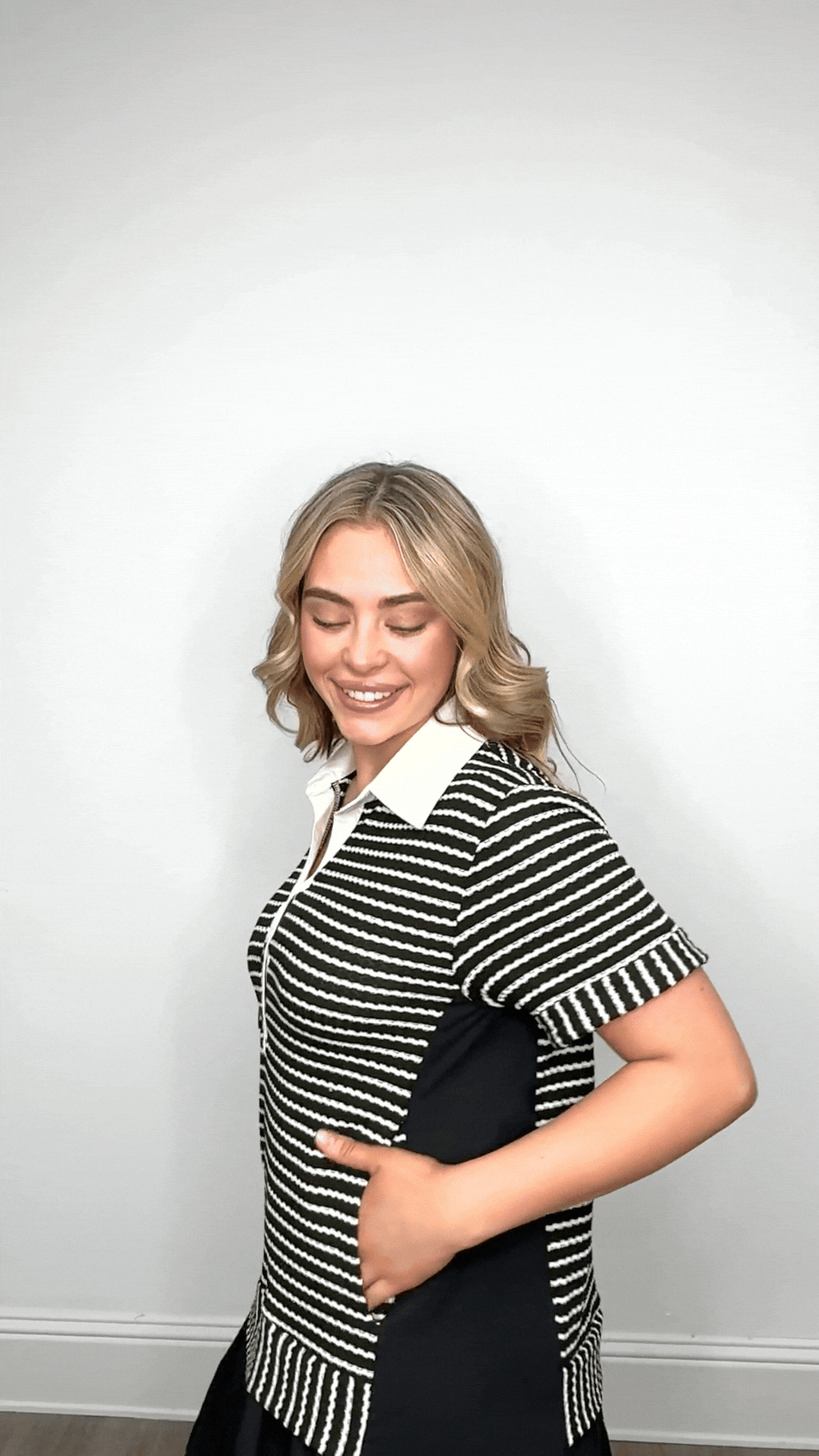Black striped knit top with attached skirt for women, stylish ladies dress by Grace+Emma, casual and comfortable outfit.