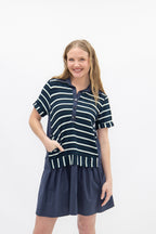 Navy striped knit top with attached skirt for ladies by Grace+Emma, casual and stylish women’s dress on model.