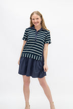 Navy striped knit top with attached skirt for ladies, Grace+Emma, featuring a stylish and comfortable design.
