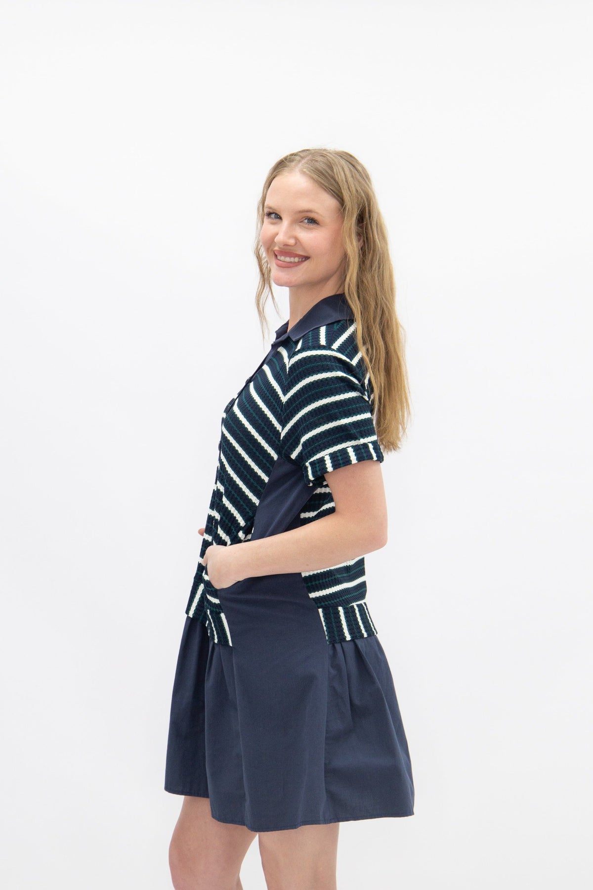 Navy striped knit top with attached skirt, women's dress by Grace+Emma, featuring a fitted bodice and stylish design.