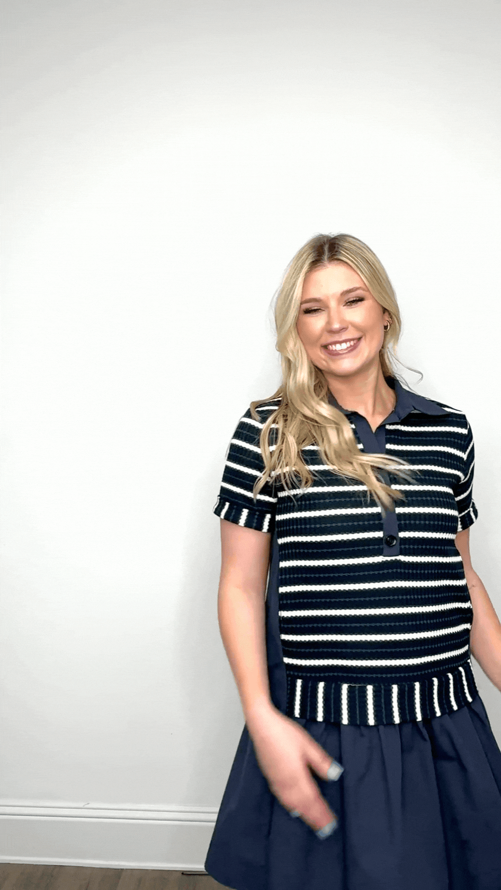 Navy striped knit top with attached skirt from Grace+Emma women's dress, featuring a fitted design and casual style.