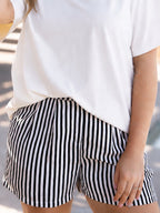 Black striped ladies trouser shorts by Grace+Emma, featuring a stylish, tailored design perfect for casual or semi-formal wear.