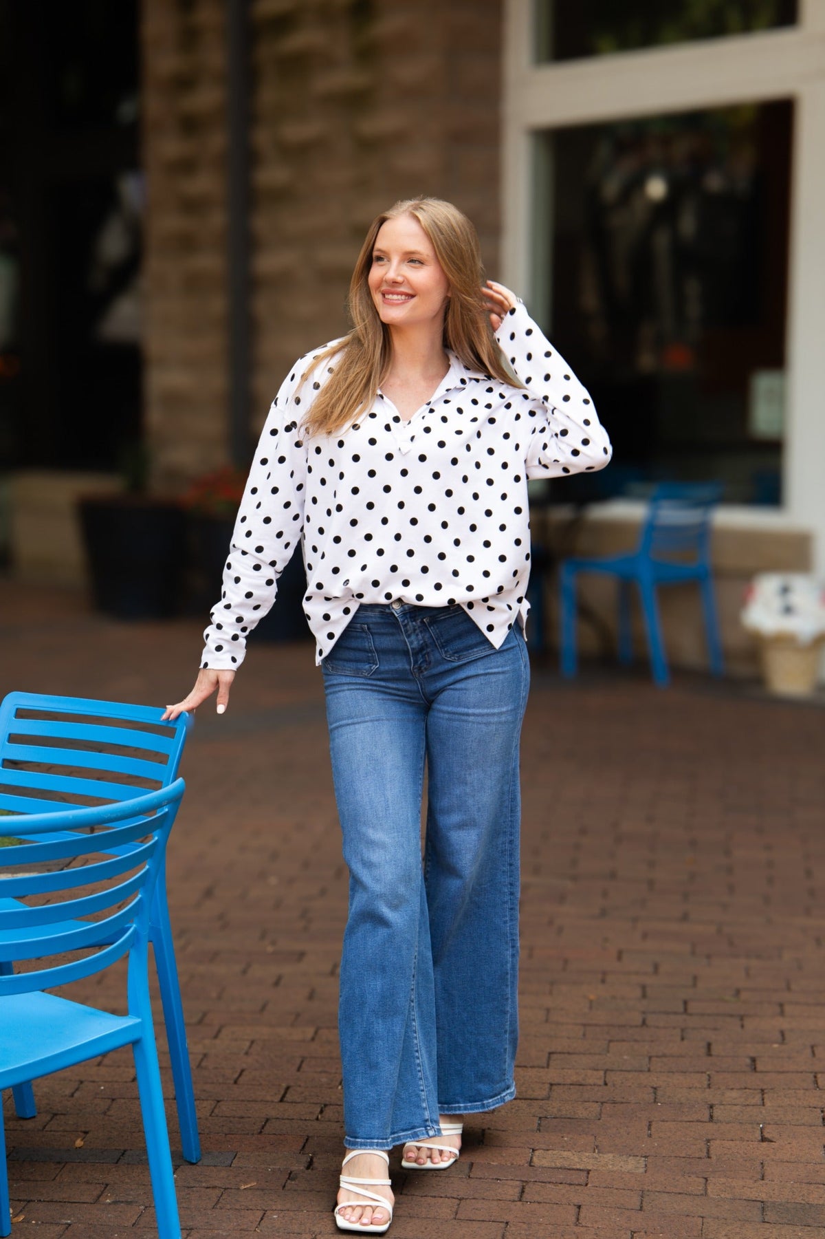 Black polka dot V-neck collared pullover for women by Grace+Emma, featuring a stylish and comfortable design.