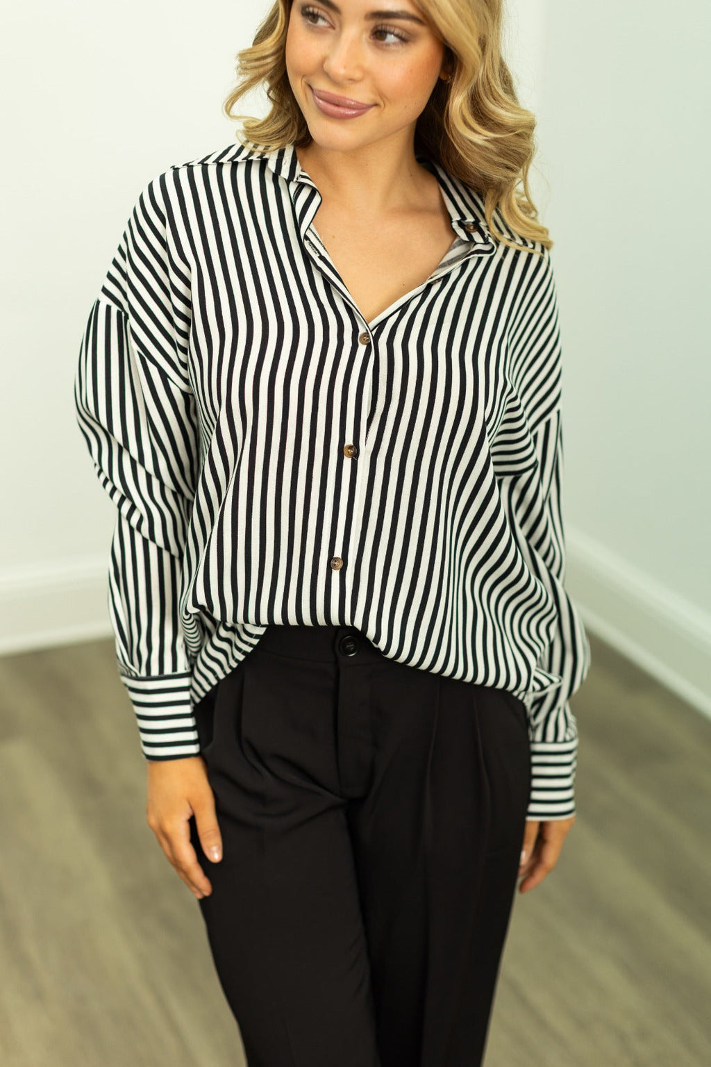 Grace+Emma Kathryn Classic button-up top for women in black stripes, featuring a tailored fit and stylish design.