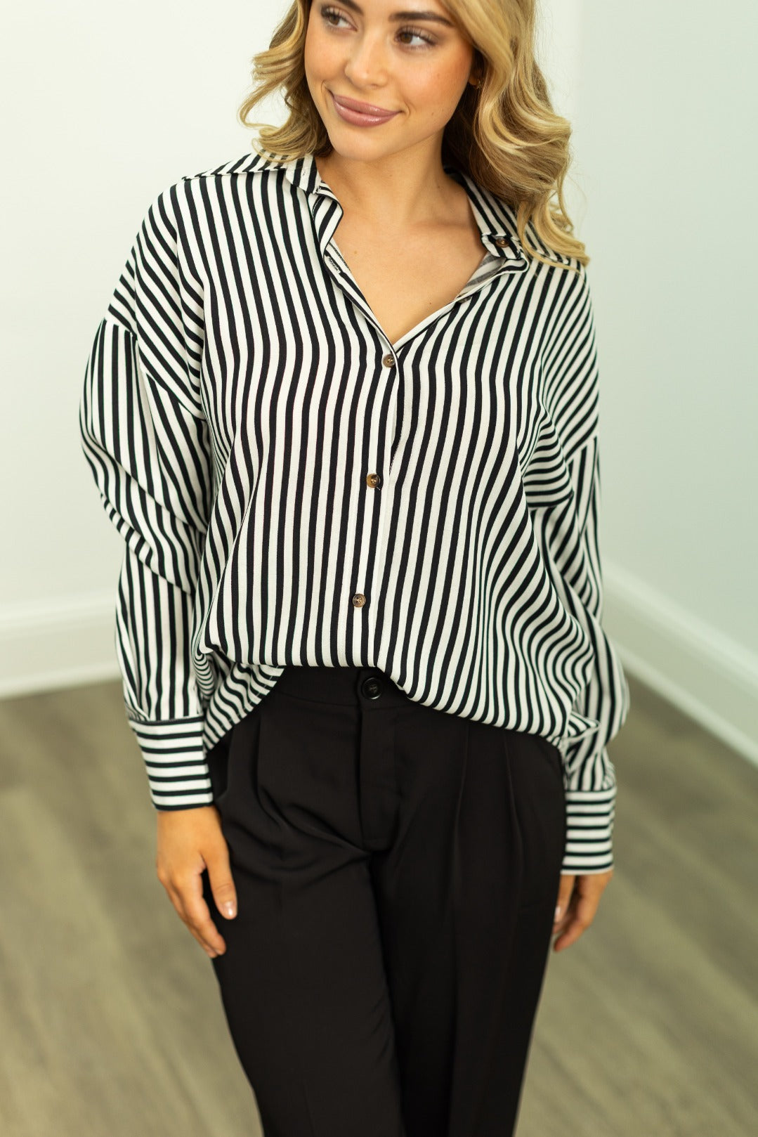 Grace+Emma Kathryn Classic button-up top for women in black stripes, featuring a tailored fit and stylish design.