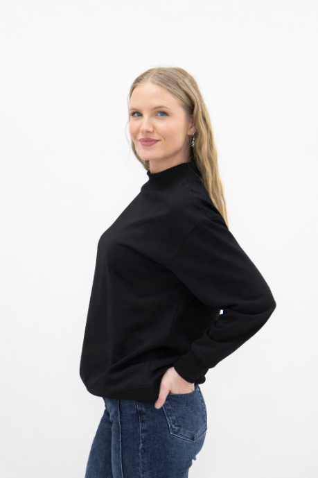 Black Grace+Emma ladies mock neck sweatshirt, cozy long-sleeve top with a fitted silhouette and ribbed collar.