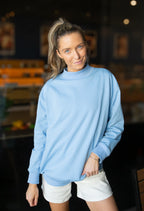 Blue Grace+Emma ladies' mock neck sweatshirt, lightweight and casual, shown on a model with long sleeves and a relaxed fit.