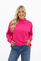 Hot pink Grace+Emma ladies mock neck sweatshirt, cozy long-sleeve top in XS size with a stylish mock neckline.