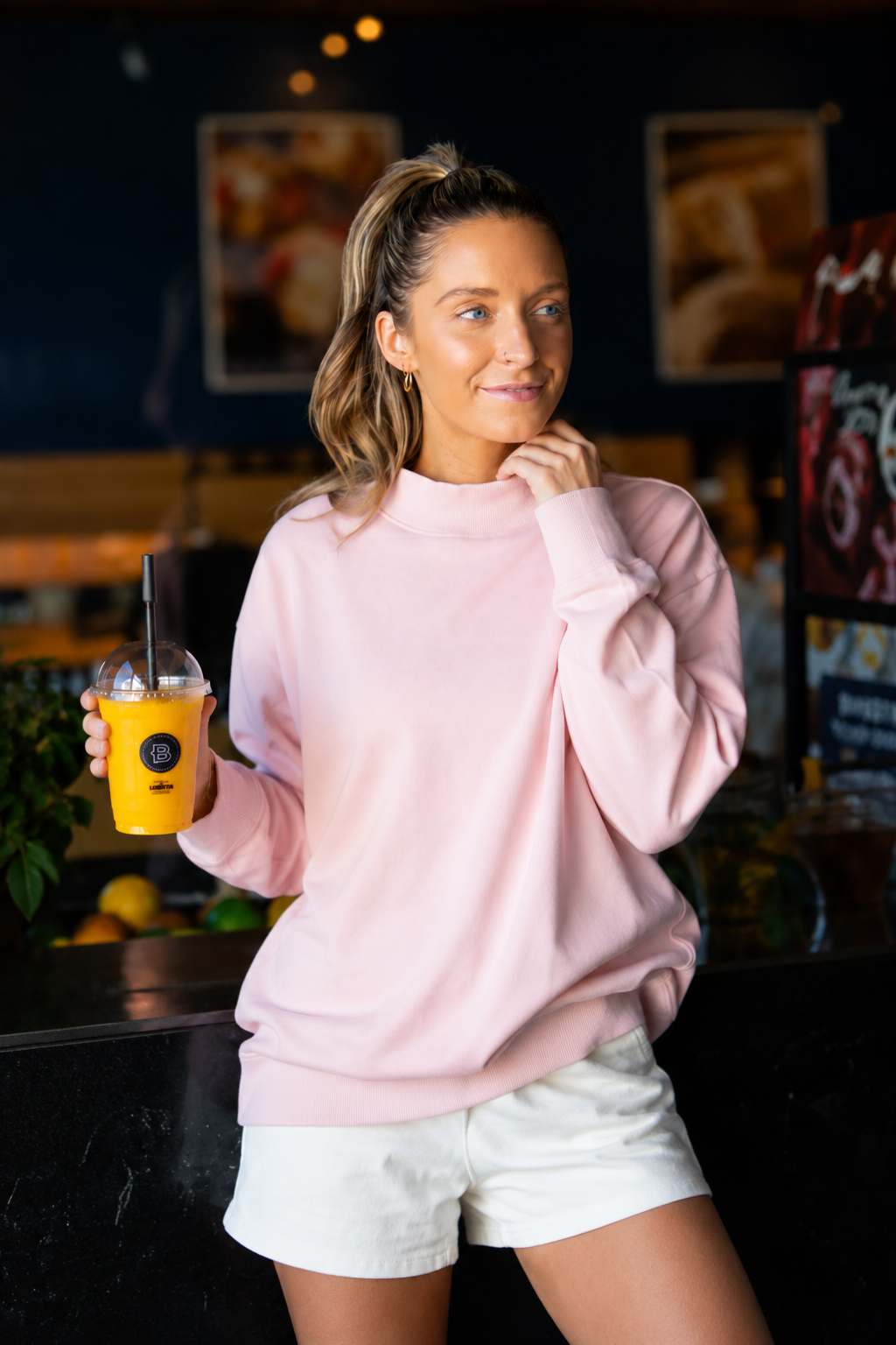 Light pink mock neck sweatshirt for ladies by Grace+Emma, casual top with a cozy fit and soft fabric.