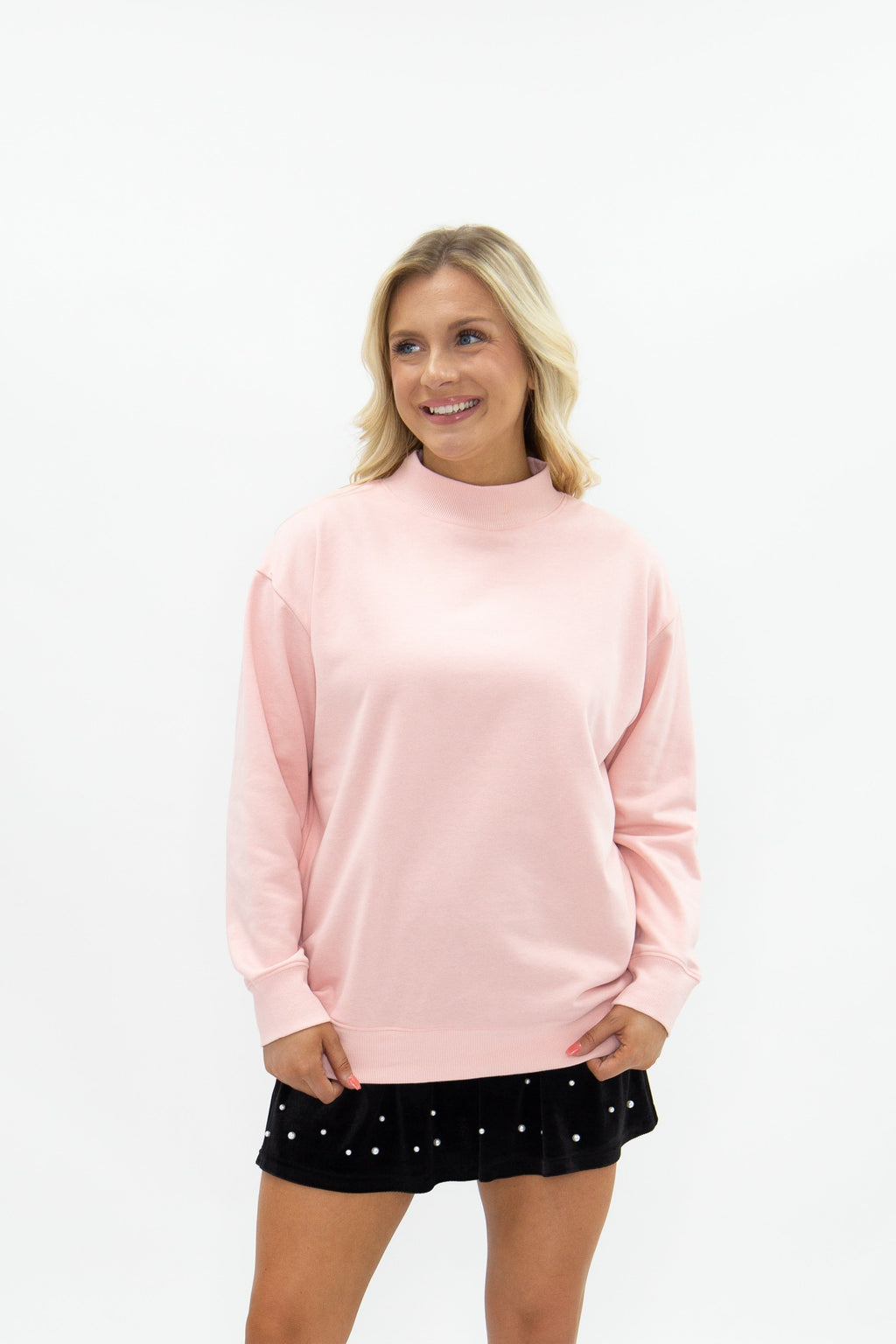 Light pink Grace+Emma ladies' mock neck sweatshirt, casual top with long sleeves and relaxed fit.