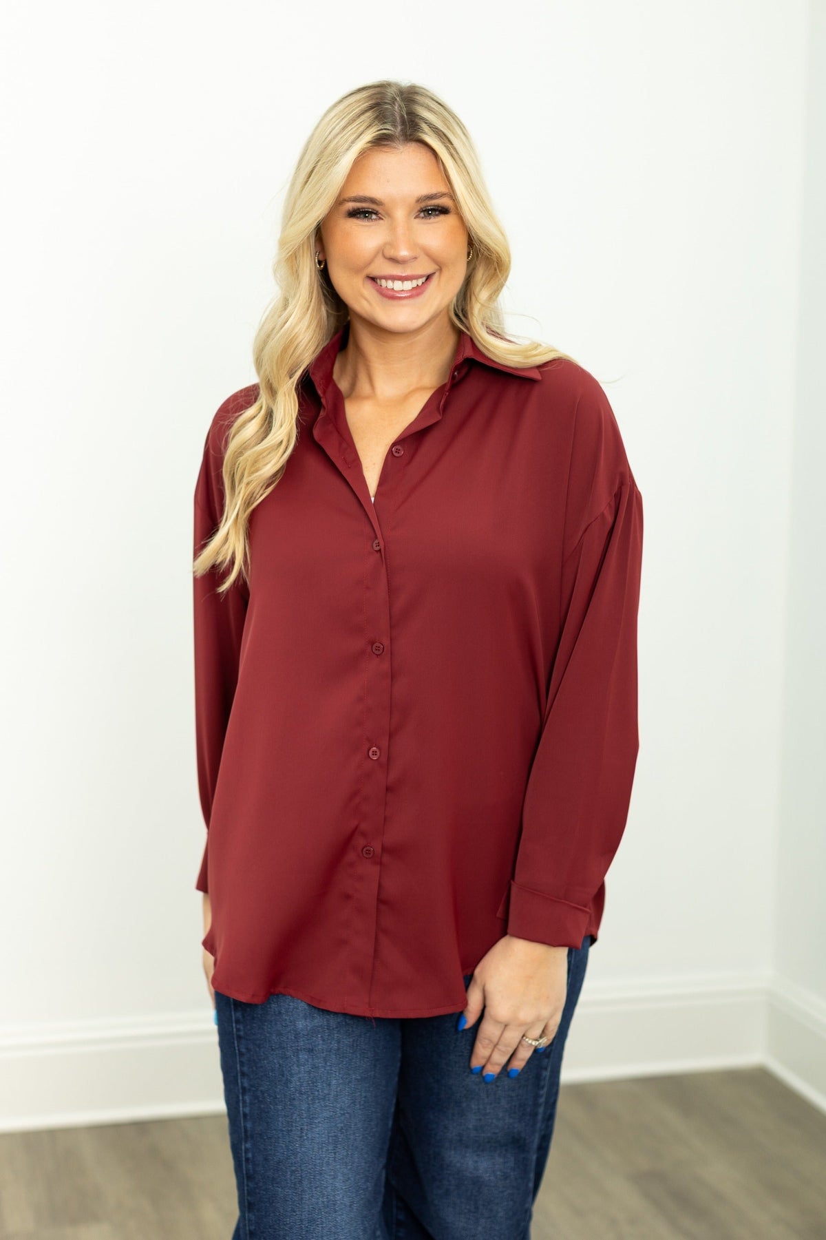 Maroon women's button-up top from Grace+Emma, The Kathryn, shown in size XS with collar and long sleeves.