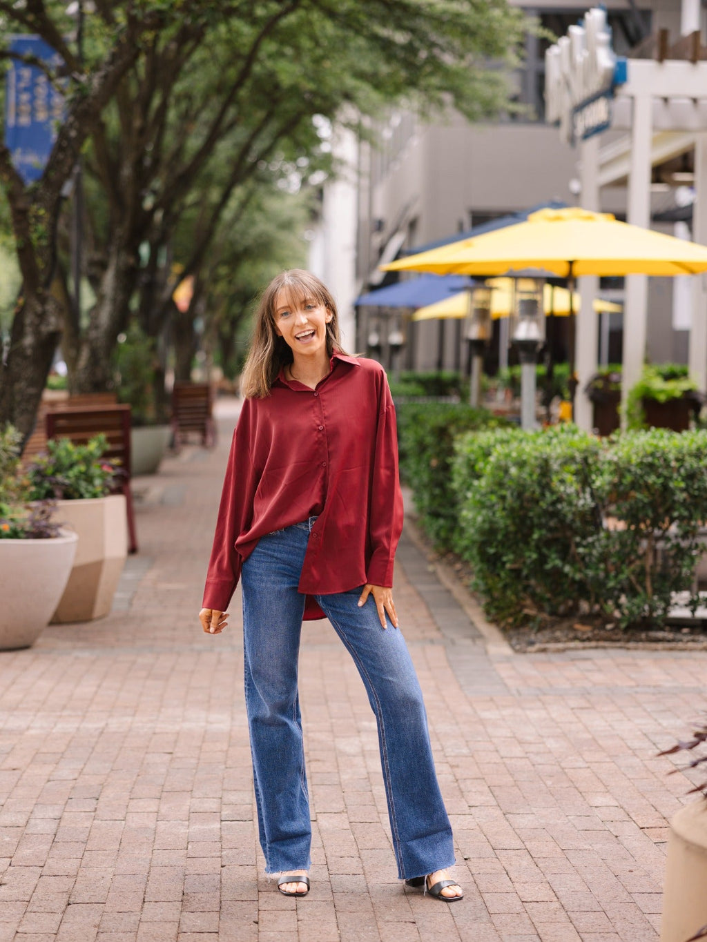 Maroon ladies top by Grace+Emma, The Kathryn Button-Up, shown in XS size, featuring a classic collar and button-front design.