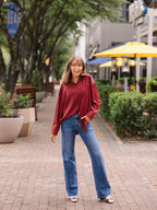 Maroon Kathryn Button-Up ladies top by Grace+Emma, shown in size XS with front buttons and classic collar.