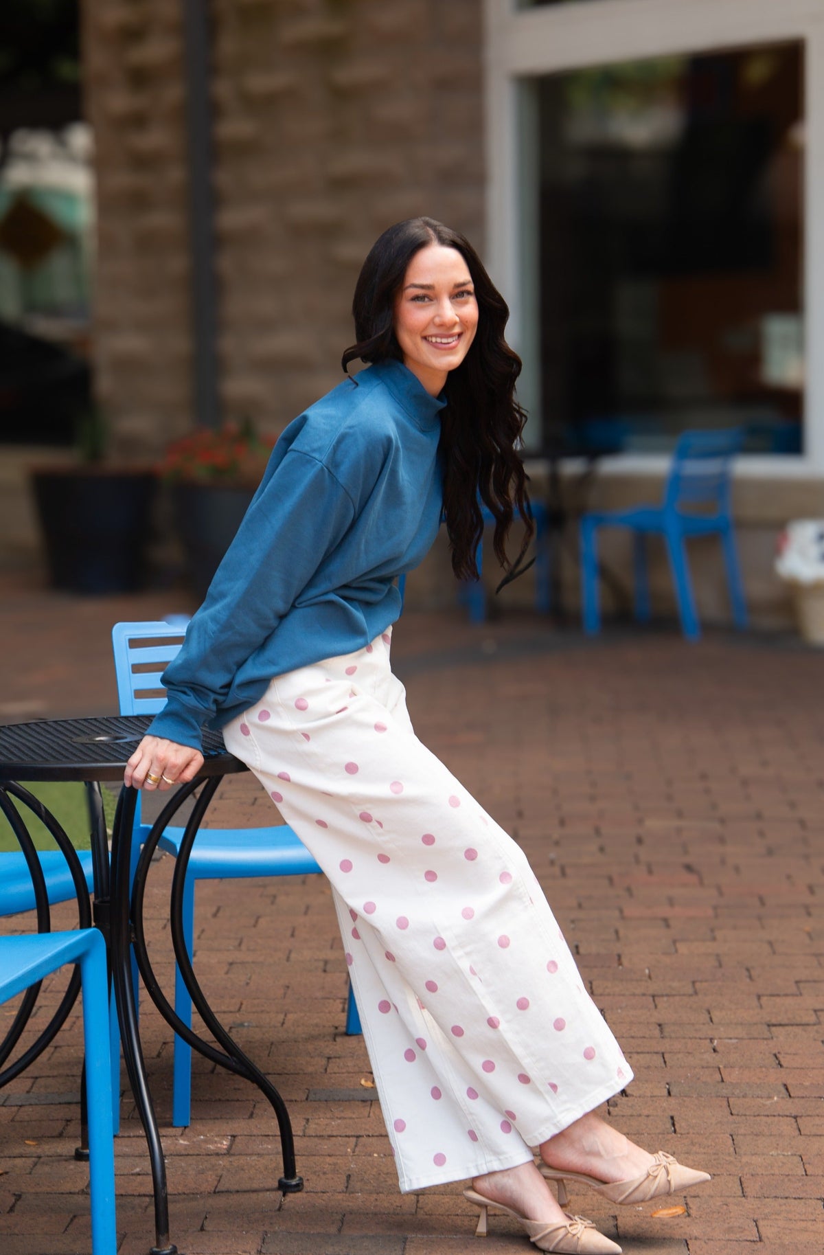 Navy mock neck sweatshirt for women by Grace+Emma, featuring a cozy fit and casual style, shown on a model.