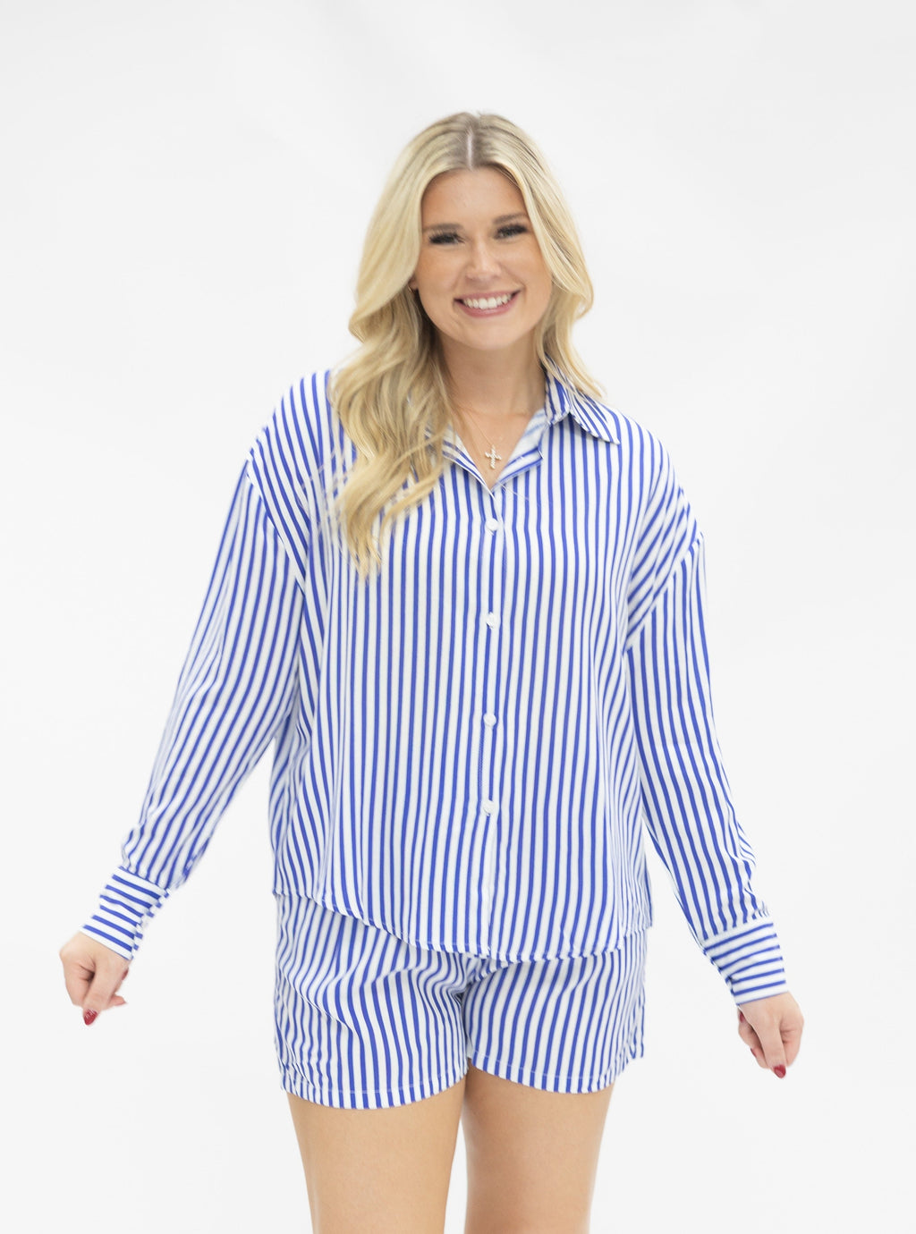 Grace+Emma Kathryn Classic Button-Up top in blue stripe for ladies, featuring a stylish button-up design and vibrant pattern.
