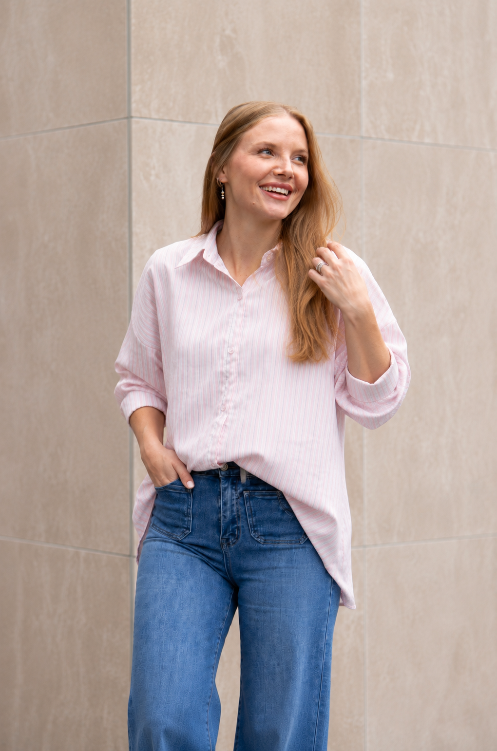 Pink and white striped Grace+Emma The Kathryn button-up ladies top, casual and stylish, shown on a white background.
