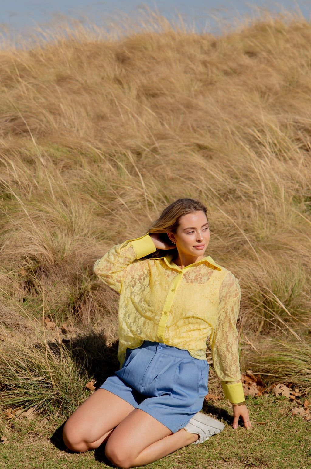 Yellow lace Kathryn Classic button-up top for ladies by Grace+Emma, shown in XS size with a stylish collar and long sleeves.