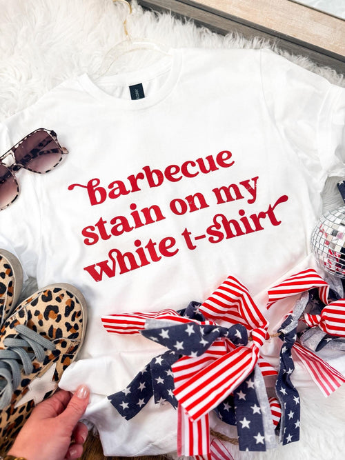 Hart and Hollow BBQ stain featuring a rustic, weathered wooden surface with a subtle barbecue sauce mark.