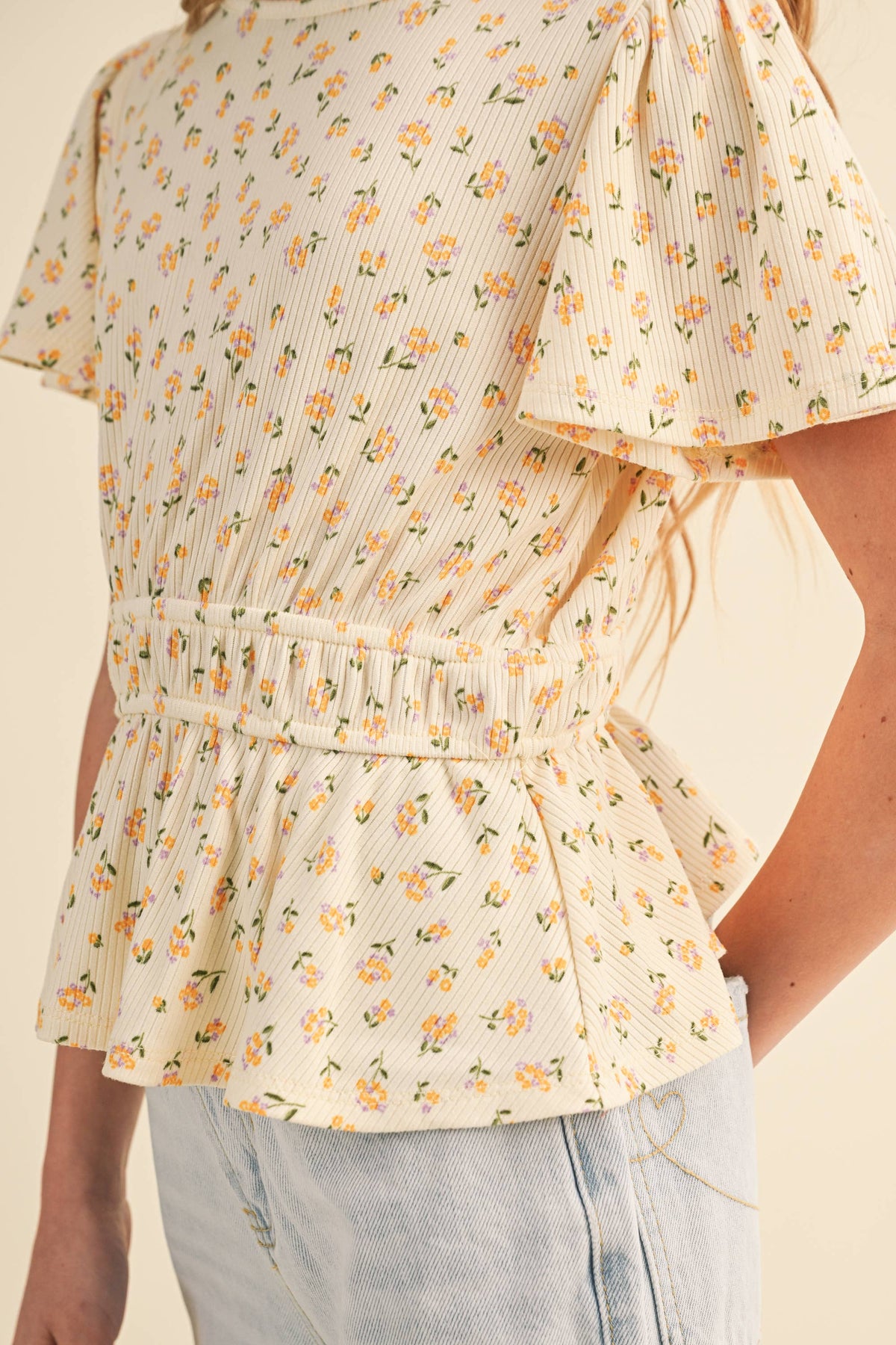 Heart and Arrow tween girls' round neck flutter sleeve peplum top, lightweight and stylish for kids.