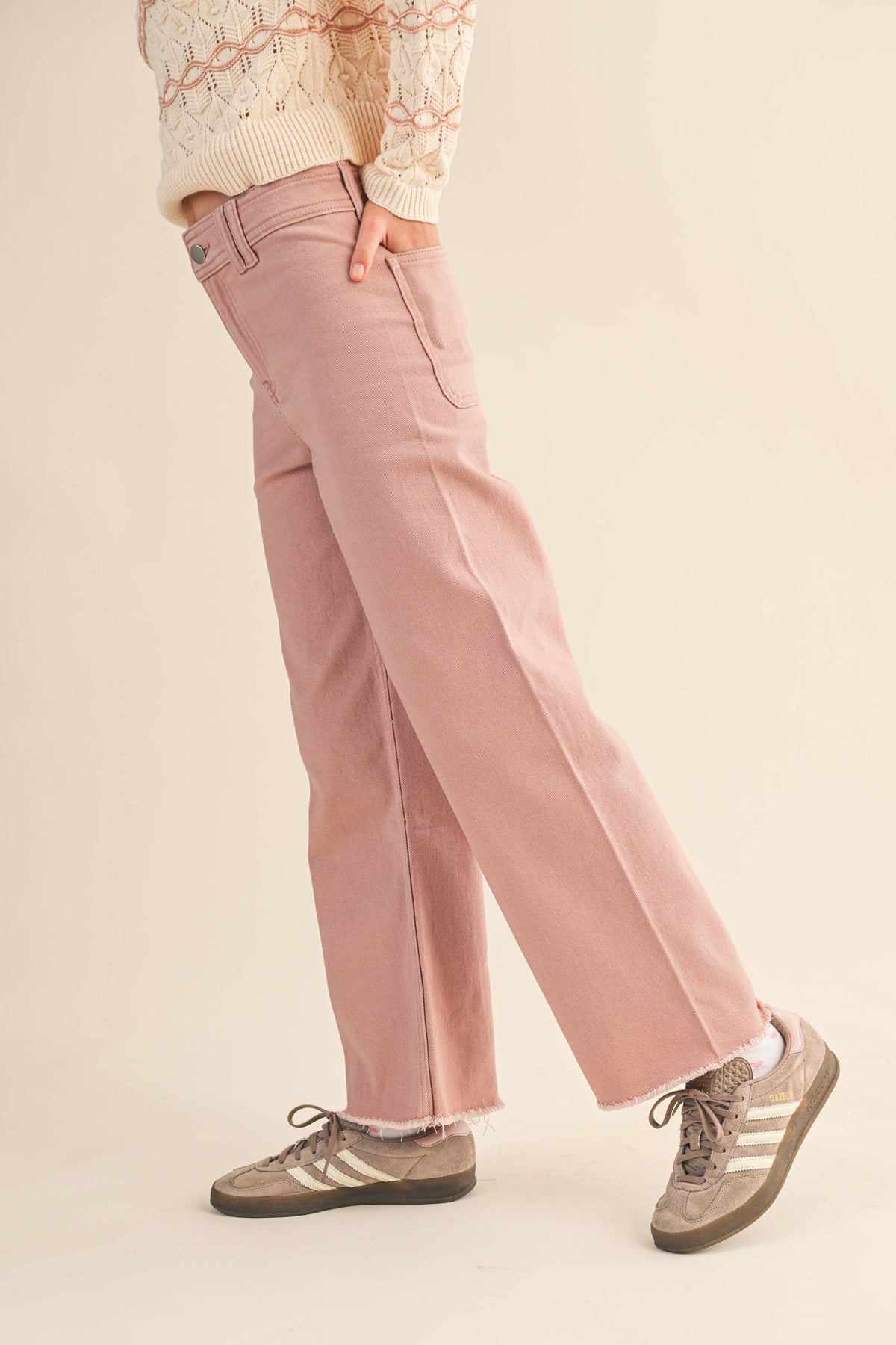 Young girl wearing Heart and Arrow tween girls' wide-leg denim pants, showcasing casual, comfortable denim style.