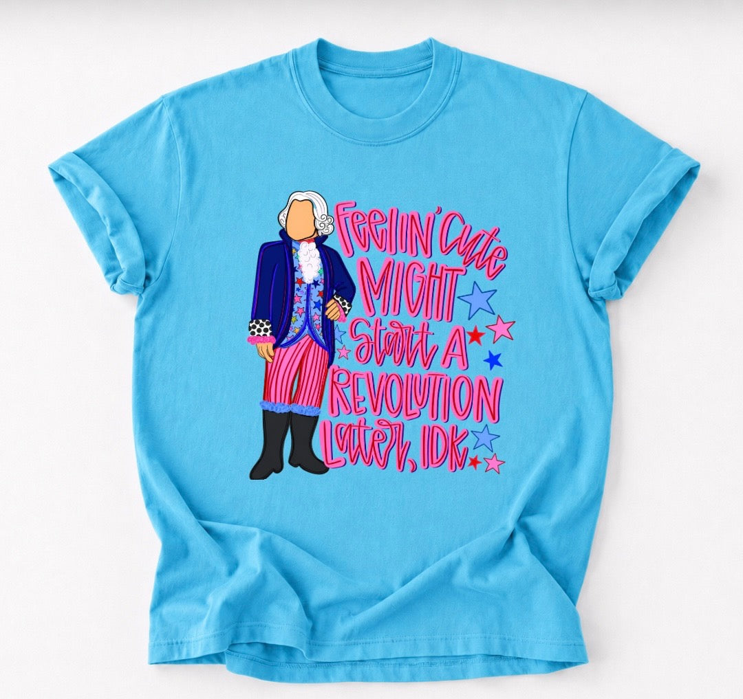 Houston Customs Feelin' Cute Might Start a Revolution Later, Idk graphic t-shirt, front view showing bold text on soft cotton fabric.