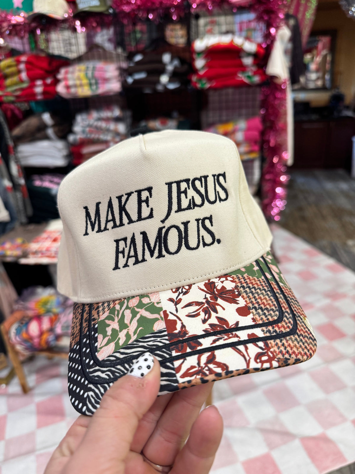 Make Jesus Famous hat by JANES BLESSINGS featuring a casual design and bold text on a comfortable fabric cap.