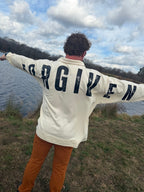 JANES BLESSINGS Forgiven sweatshirt in size S featuring soft fabric and a comfortable fit, displayed on a neutral background.
