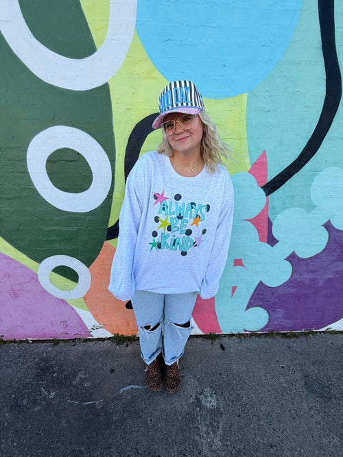 Jane's Blessings Always Be Kind sweatshirt in soft fabric with a motivational message, shown in a casual fit.