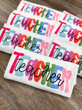 Colorful Teach Block sweatshirt by Janes Blessings featuring vibrant block designs on a soft fabric sweatshirt.