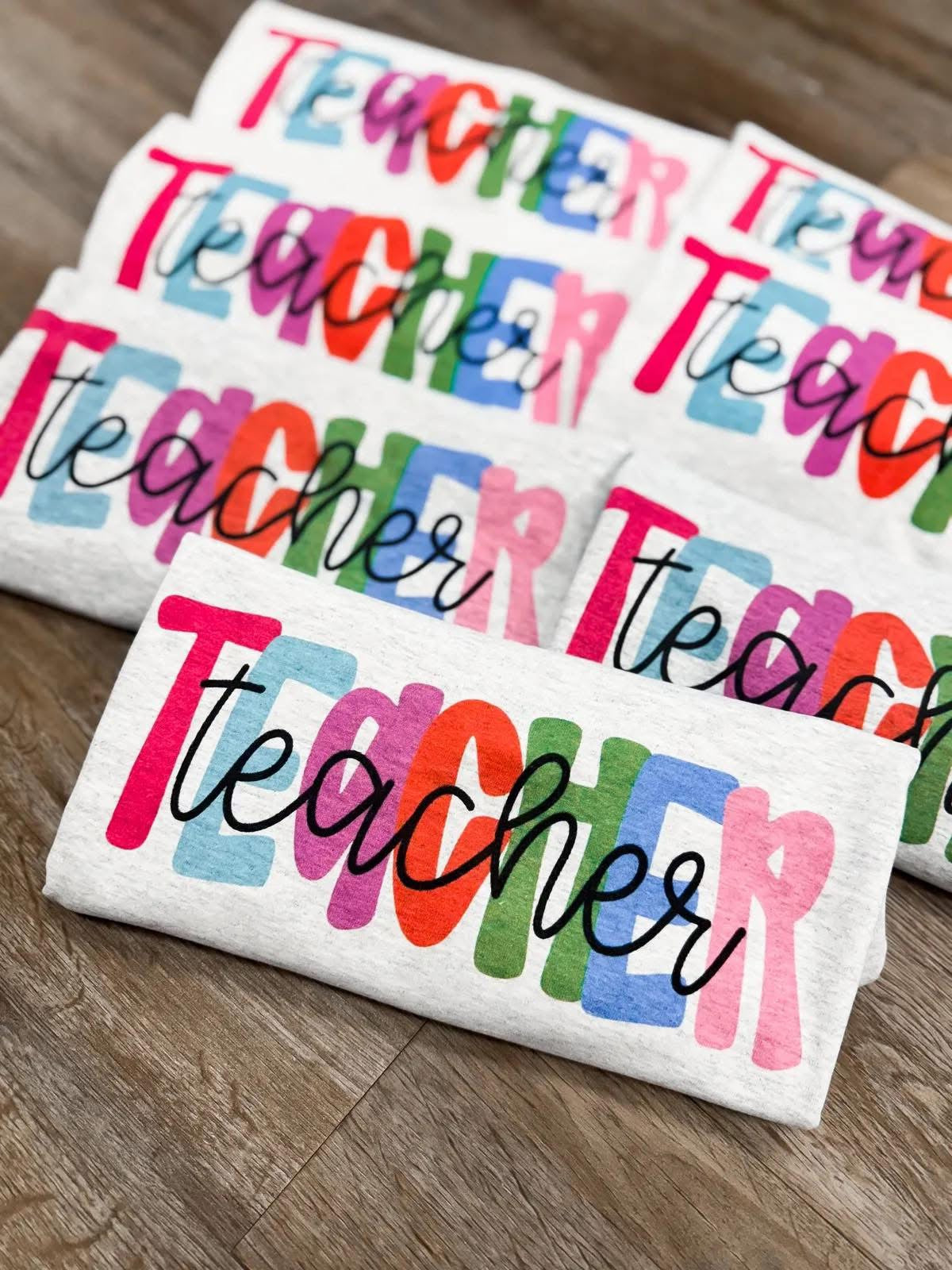 Colorful Teach Block sweatshirt by Janes Blessings featuring vibrant block designs on a soft fabric sweatshirt.