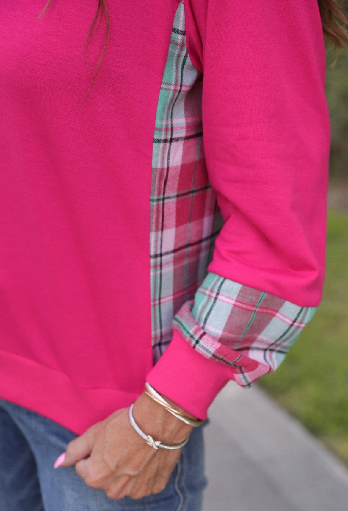 Pink Jess Lea Juniper Plaid Pullover shown on a mannequin, featuring a cozy, stylish knit with a plaid pattern.